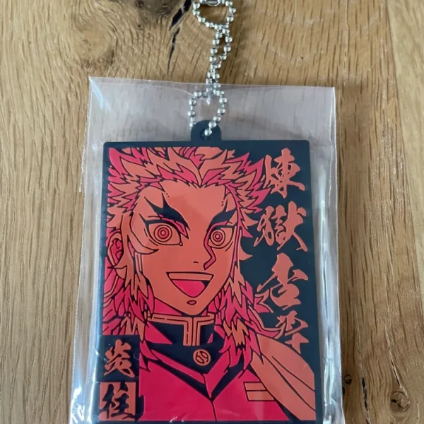 Demon Slayer – Porte-clés Kyojuro Rengoku Ichiban Kuji Oni no Sumu Machi II (Lot H)